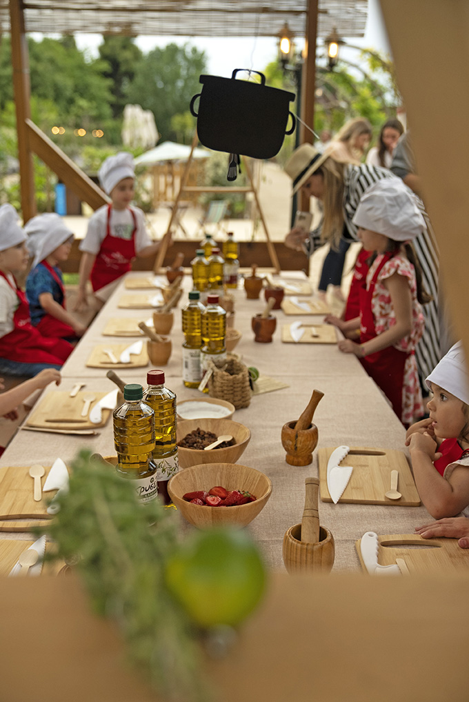 kids cooking on a table